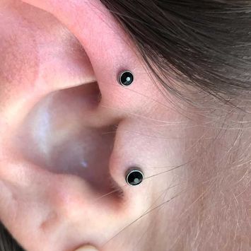 Dacapo Tattoo & Piercing perforación den el oído 
